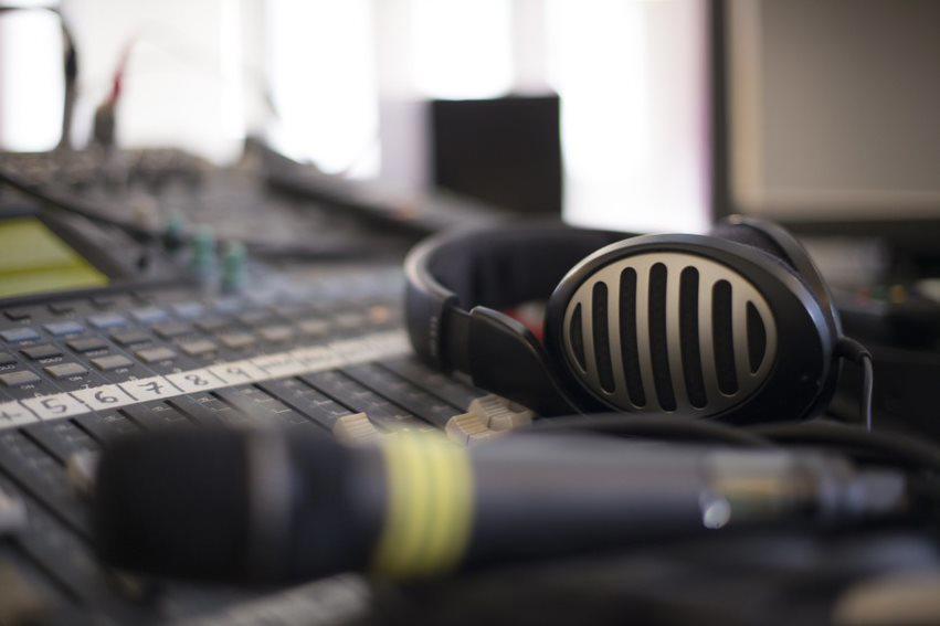 Sound system in close up with mic, headphones and mixer