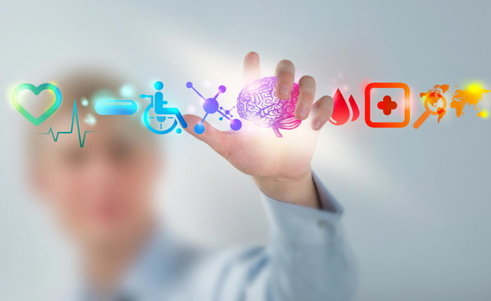 The figure of a person out of focus reaching towards a series of animated symbols 