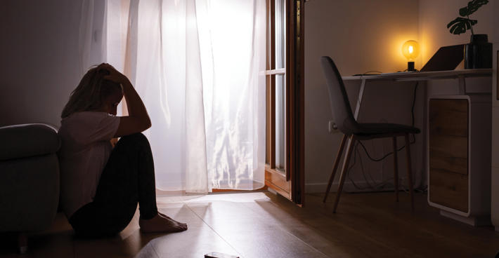 woman alone in room covid 42240