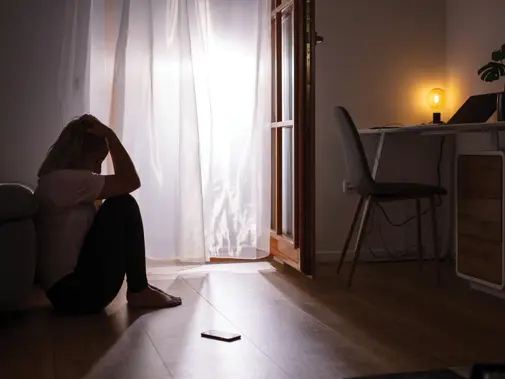 woman alone in room covid 42240