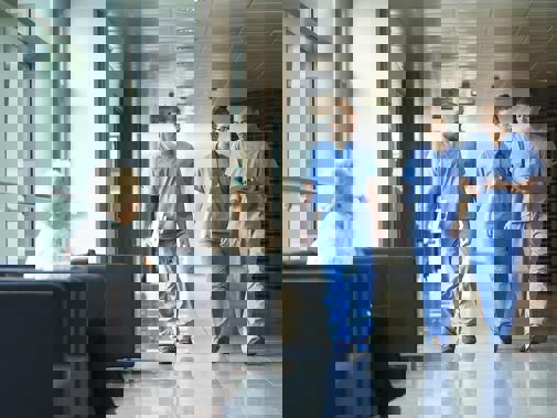 Group of trainee doctors in corridor