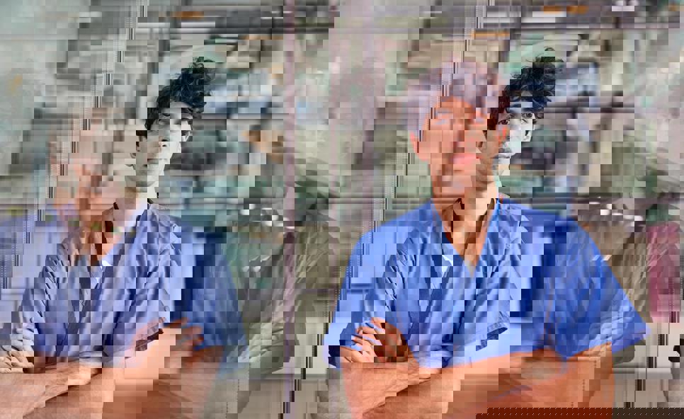 Junior doctor with arms folded