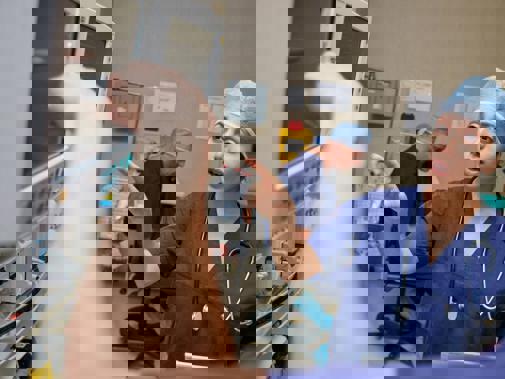 Woman and man doctors discussing xray