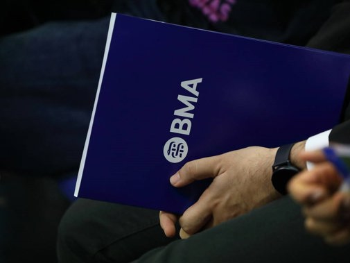 BMA booklet in lap