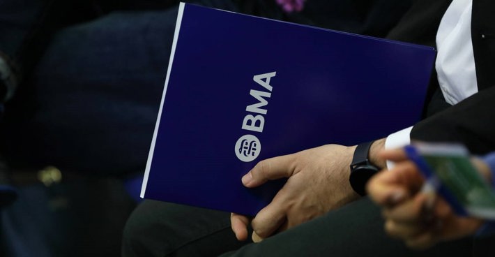 BMA booklet in lap