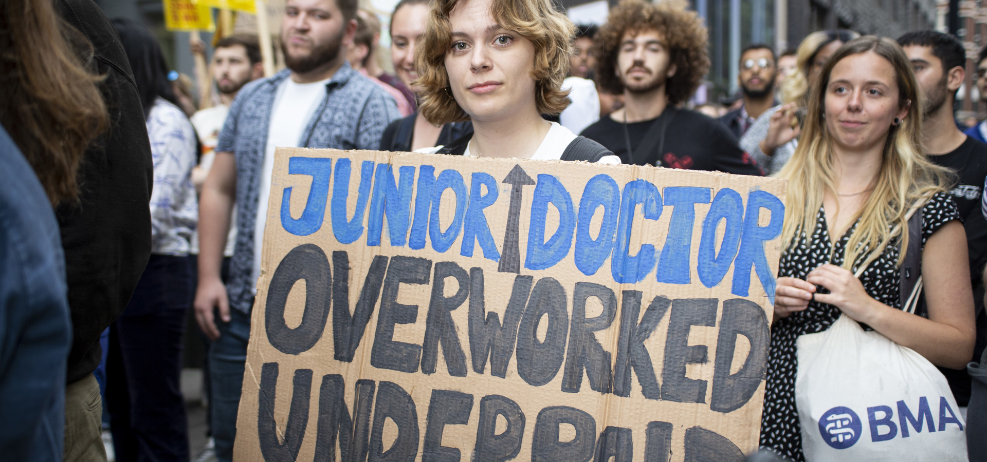 Junior doctor pay protest 2022 crowd and banner