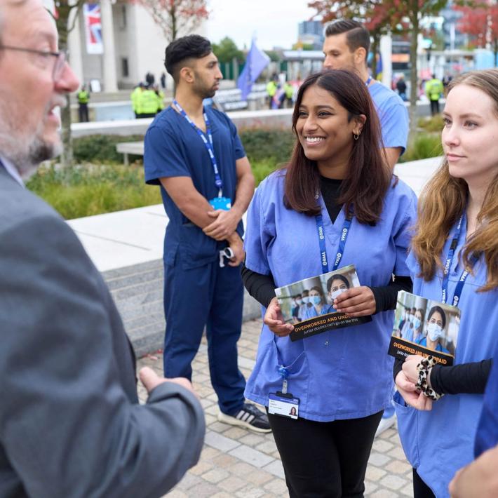 Group of junior doctors protesting with Prof Phil Banfield