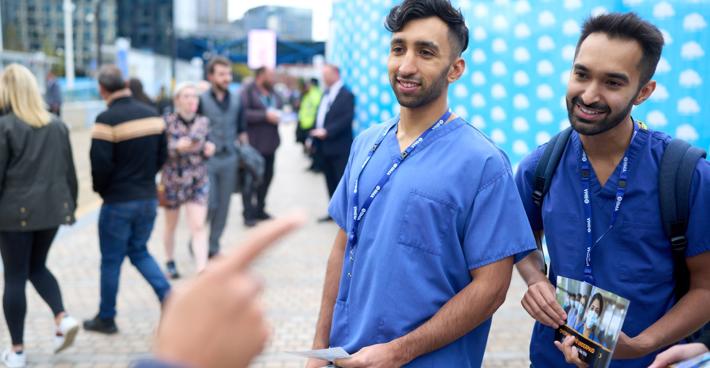 Group Of Doctors With BMA Pay ballot Materials